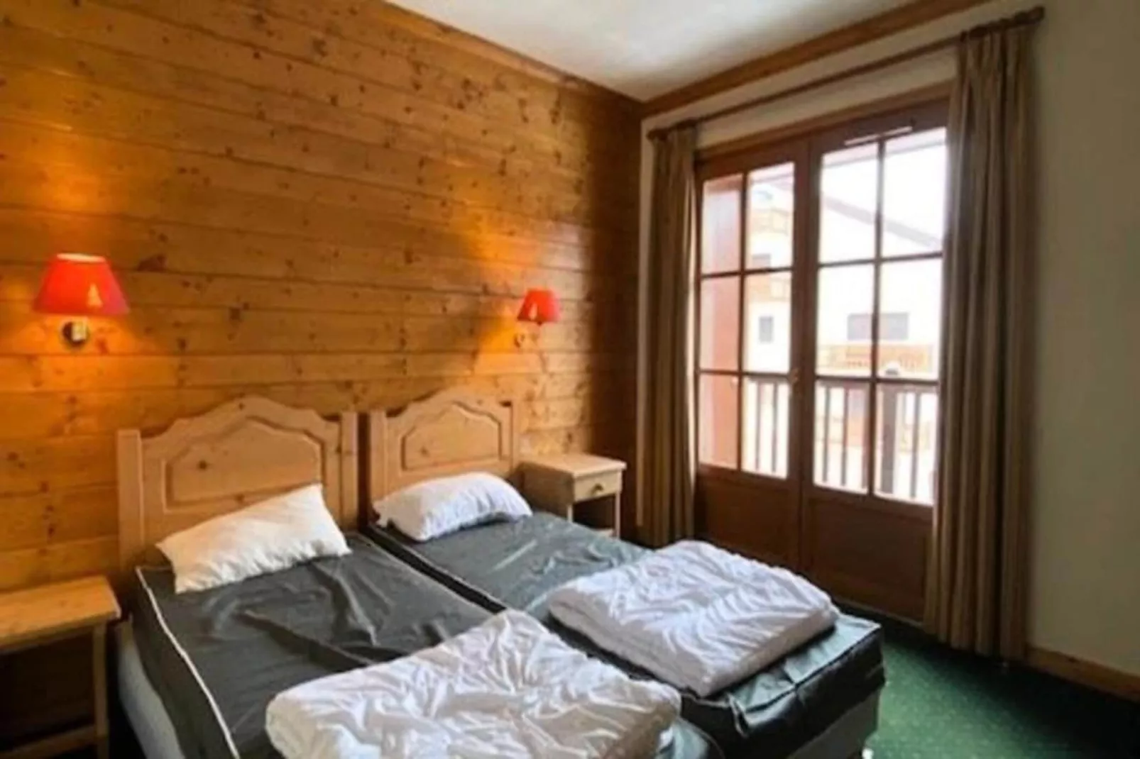 Résidence Alpina Lodge-Schlafzimmer