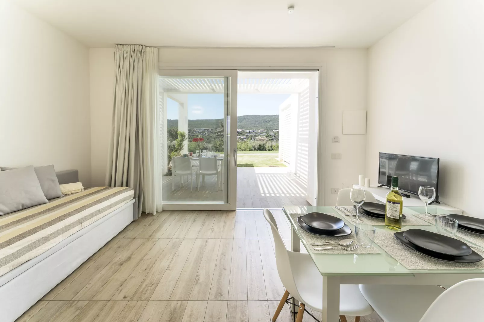 Residence Capo Falcone Stintino "Bilo 4 Comfort"-Living room