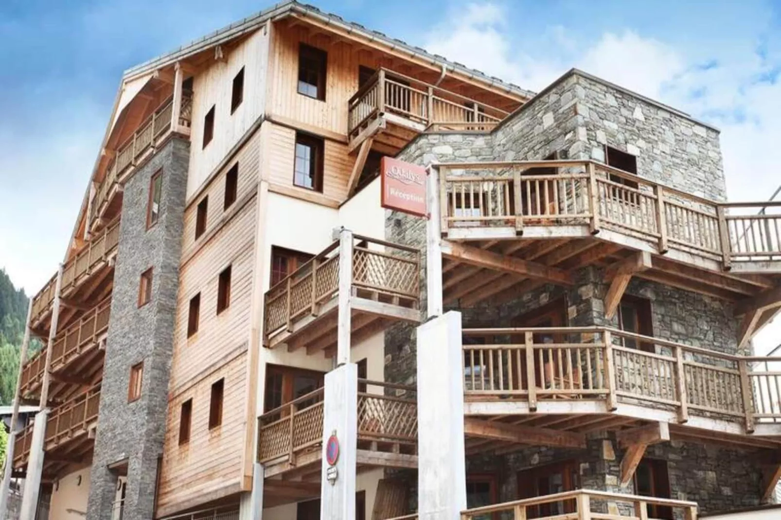 Résidence Prestige Odalys Les Fermes de Châtel-Exterior in summer