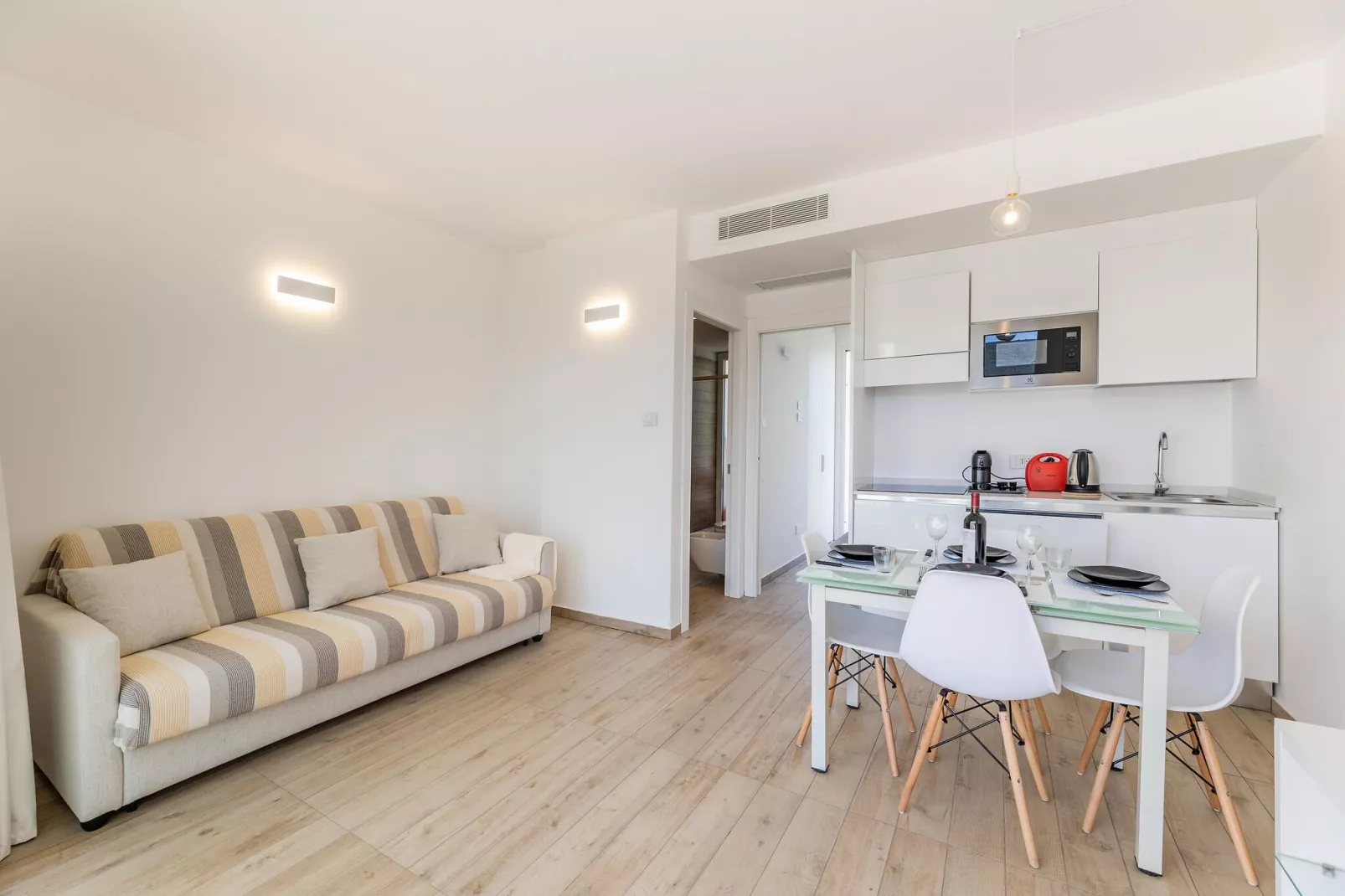 Residence Capo Falcone Stintino "Bilo 4 Premium"-Wohnzimmer