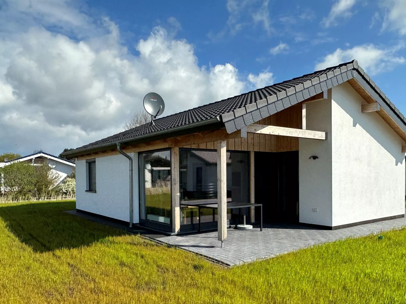 G6 Freistehendes Haus mit Garten und Wallbox