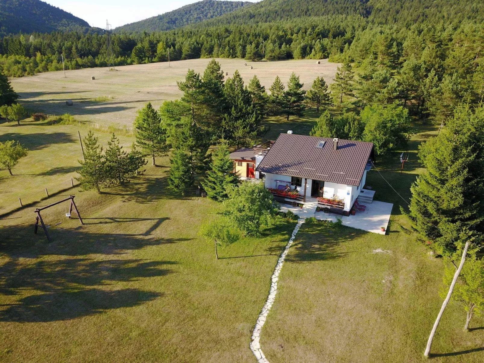 Mit Garten, Grill und Terrasse