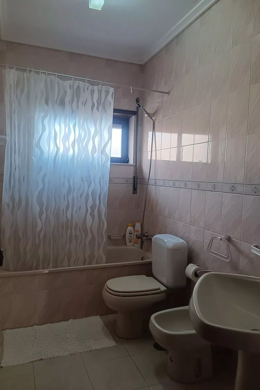 Mit den Füßen im Sand-Dedans