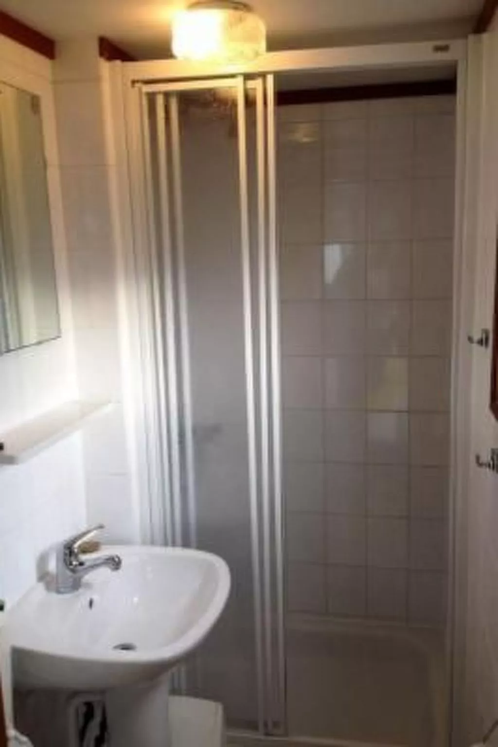 Strandnahes Chalet mit überdachter Veranda-Dedans