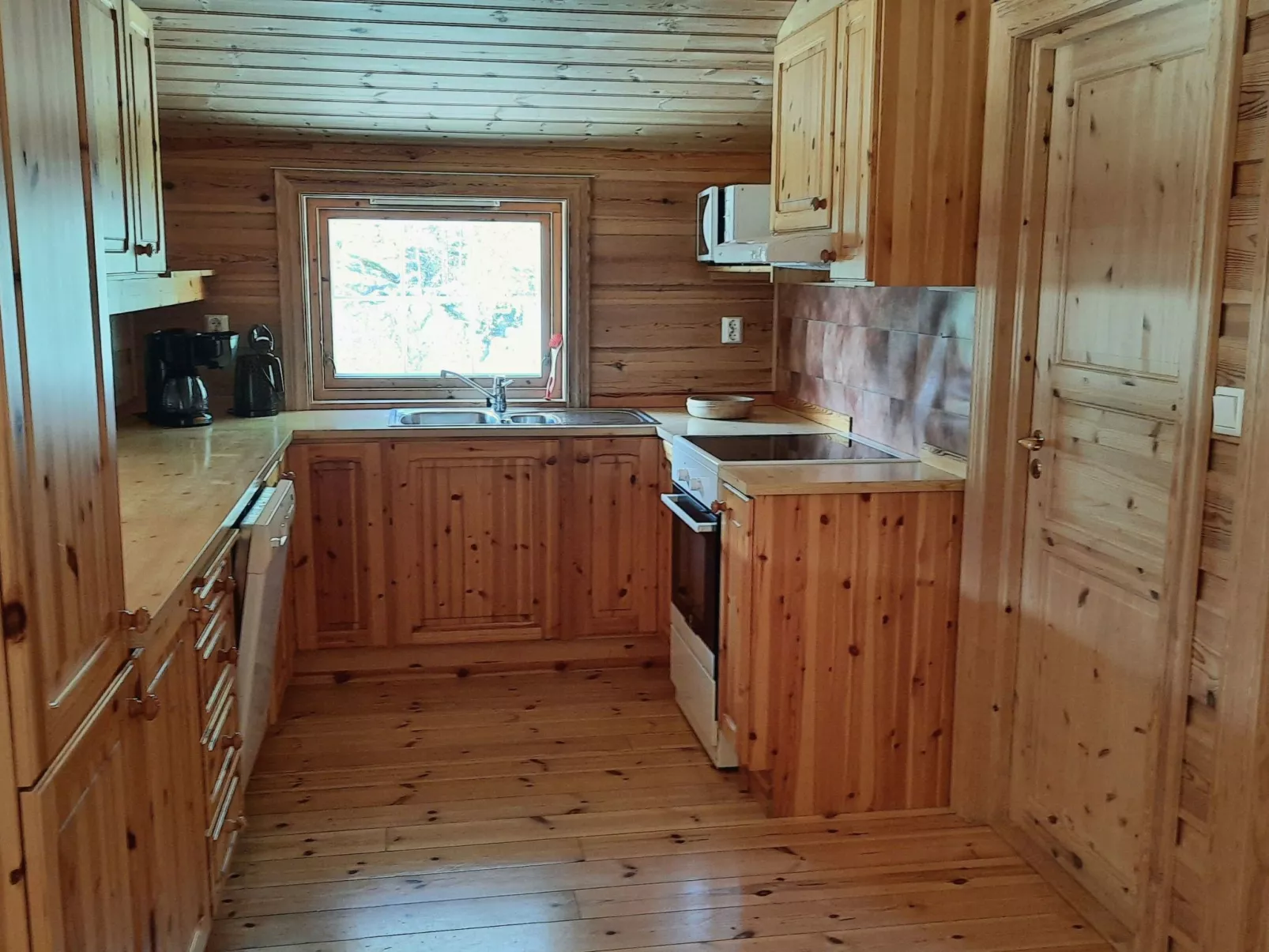 Häuschen mit Blick auf das Wasser-Dedans