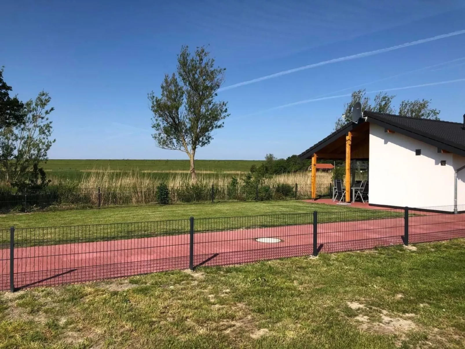K18 Ferienhaus mit Wiesenblick in Eckwarderhörne-Dehors