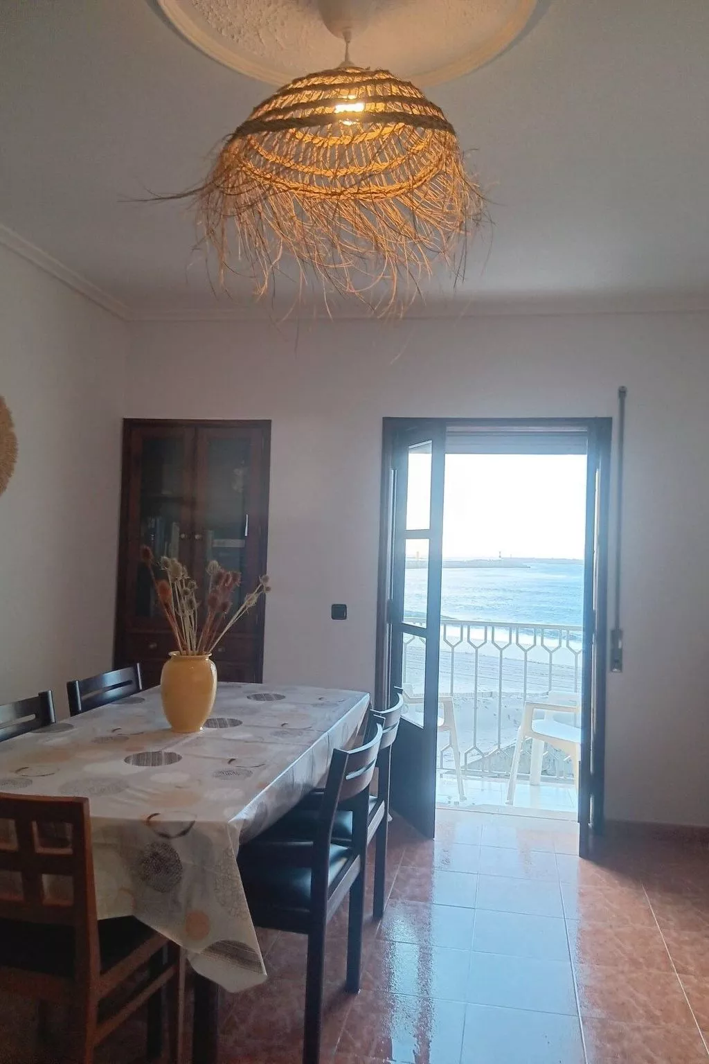 Mit den Füßen im Sand-Dedans