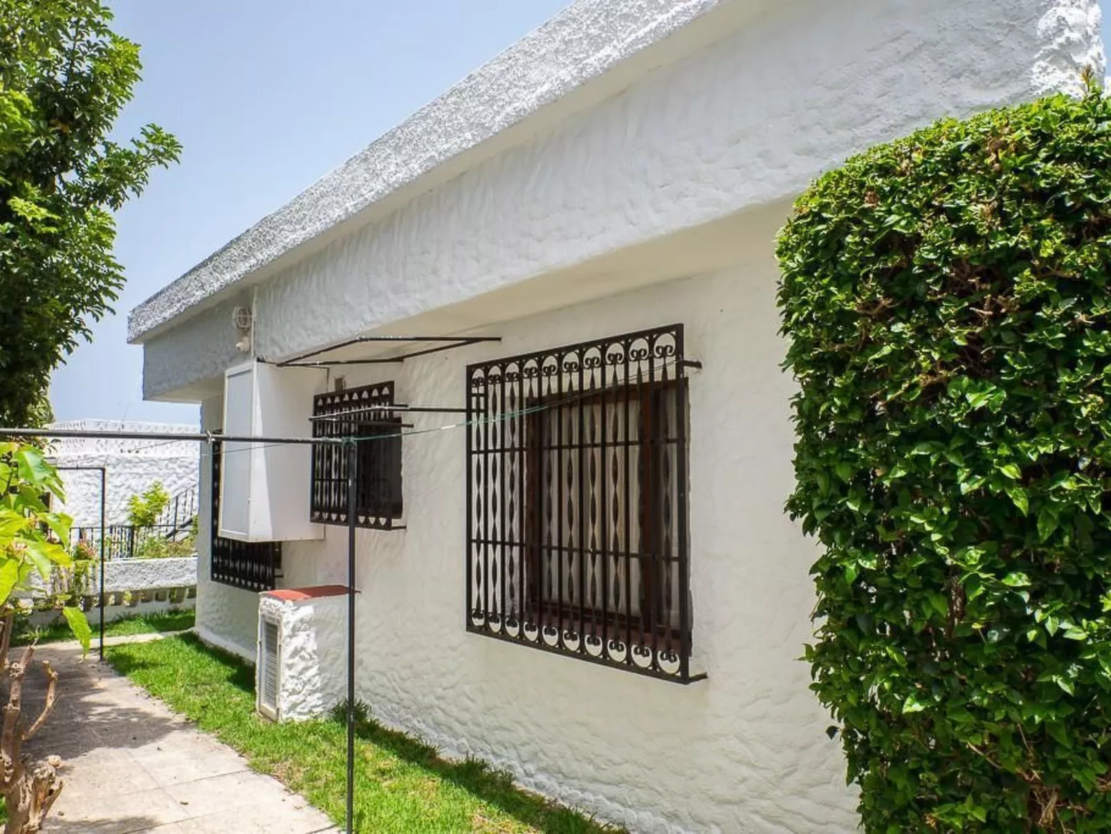 Strandnahes Haus mit Terrasse zum Sonnenuntergang - Outside
