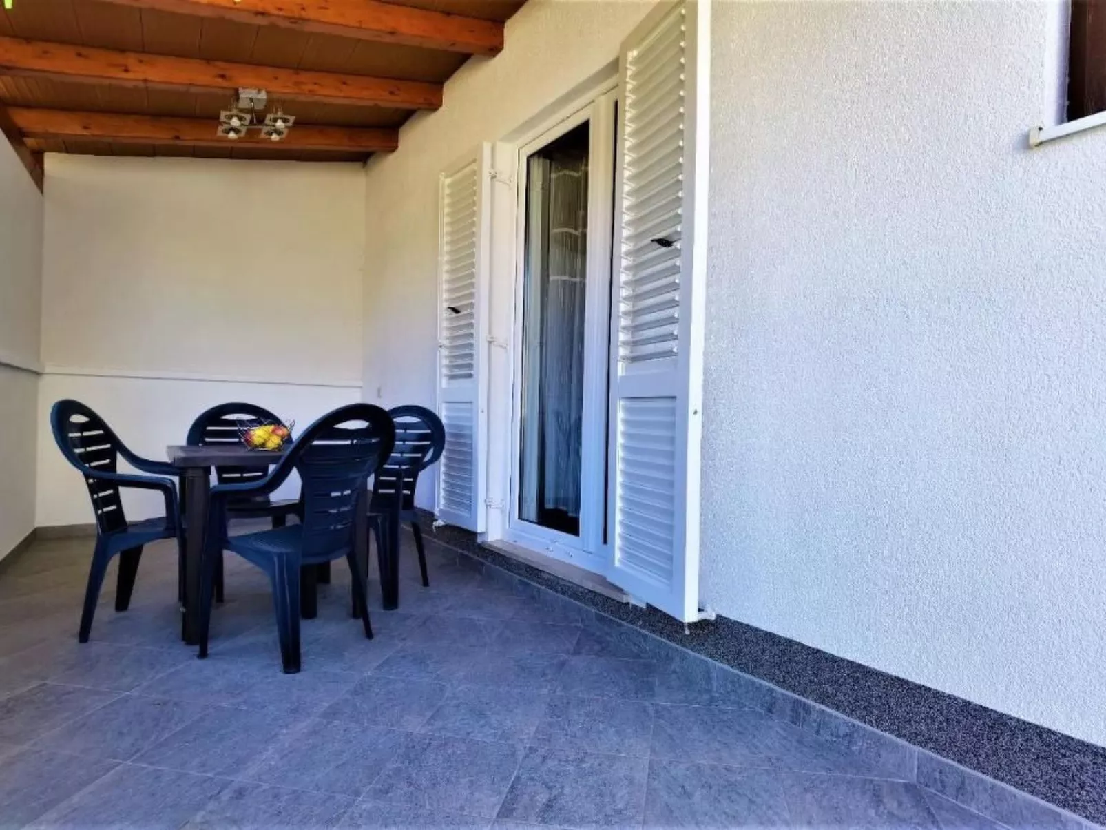 "Little Kiwi" direkt am Strand-Outside