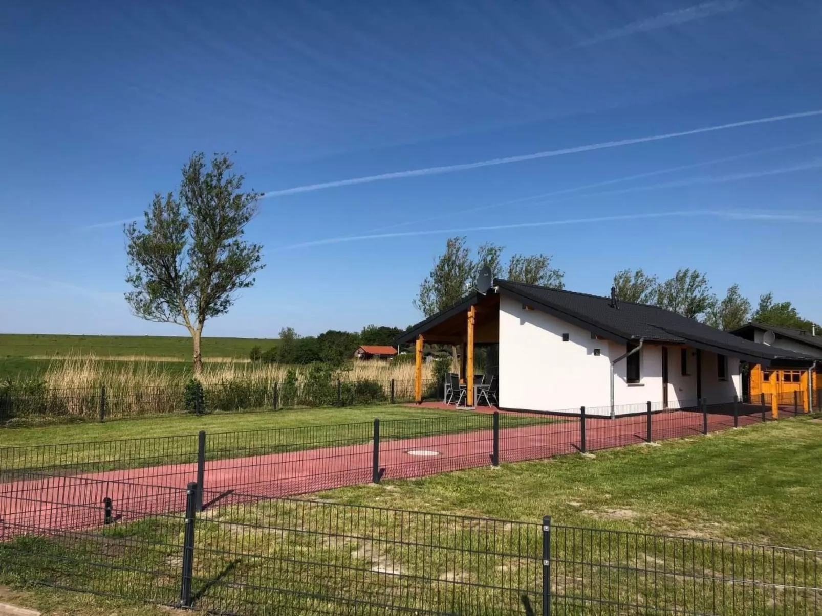 K18 Ferienhaus mit Wiesenblick in Eckwarderhörne-Dehors