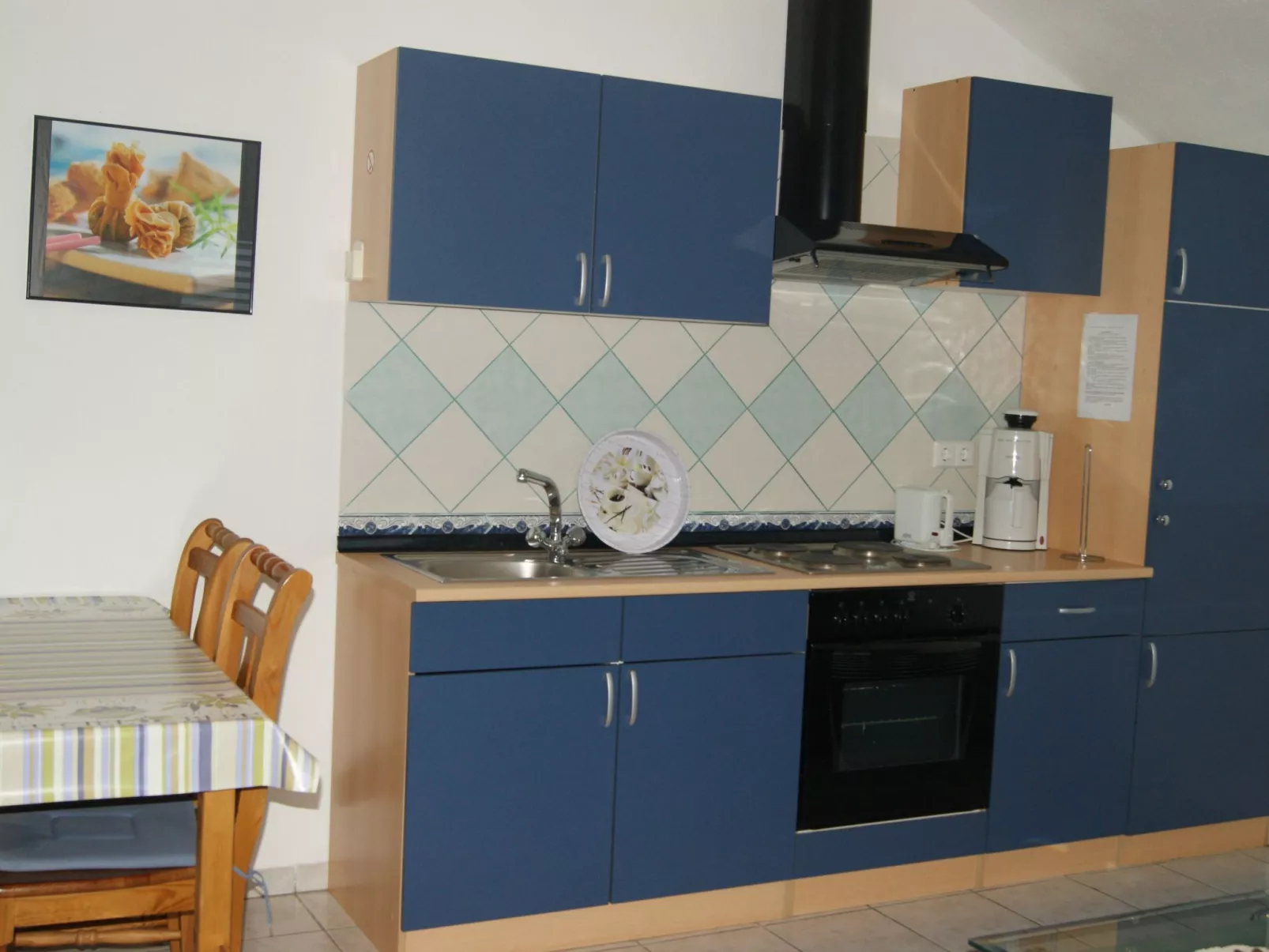 FeWo 2, mit 1. Schlafzimmer für 4. Personen mit Balkon im ersten Obergeschoss g-Inside