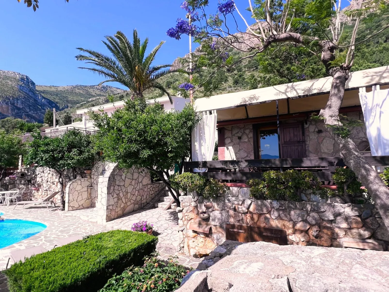 Studio-Wohnung "P Melograno" mit Pool-Dehors