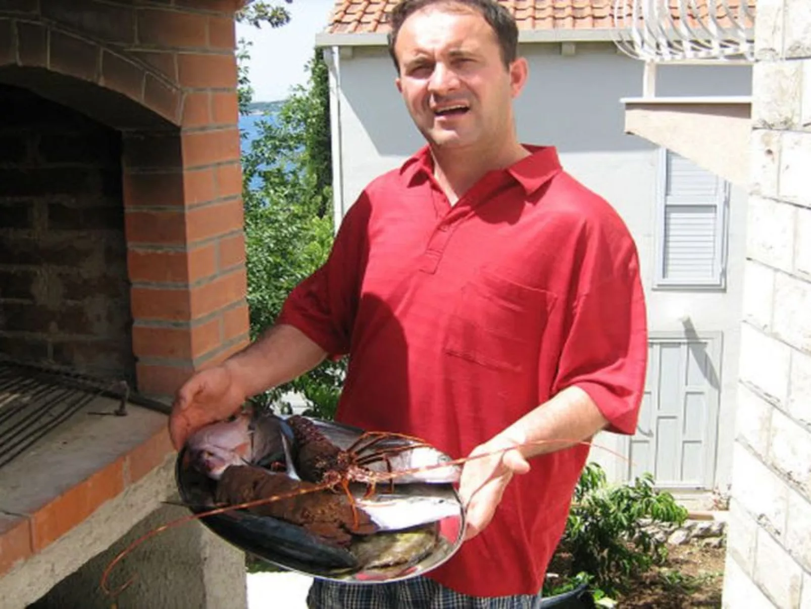 Mélanie B im ersten Stock einer Villa am Strand - Outside