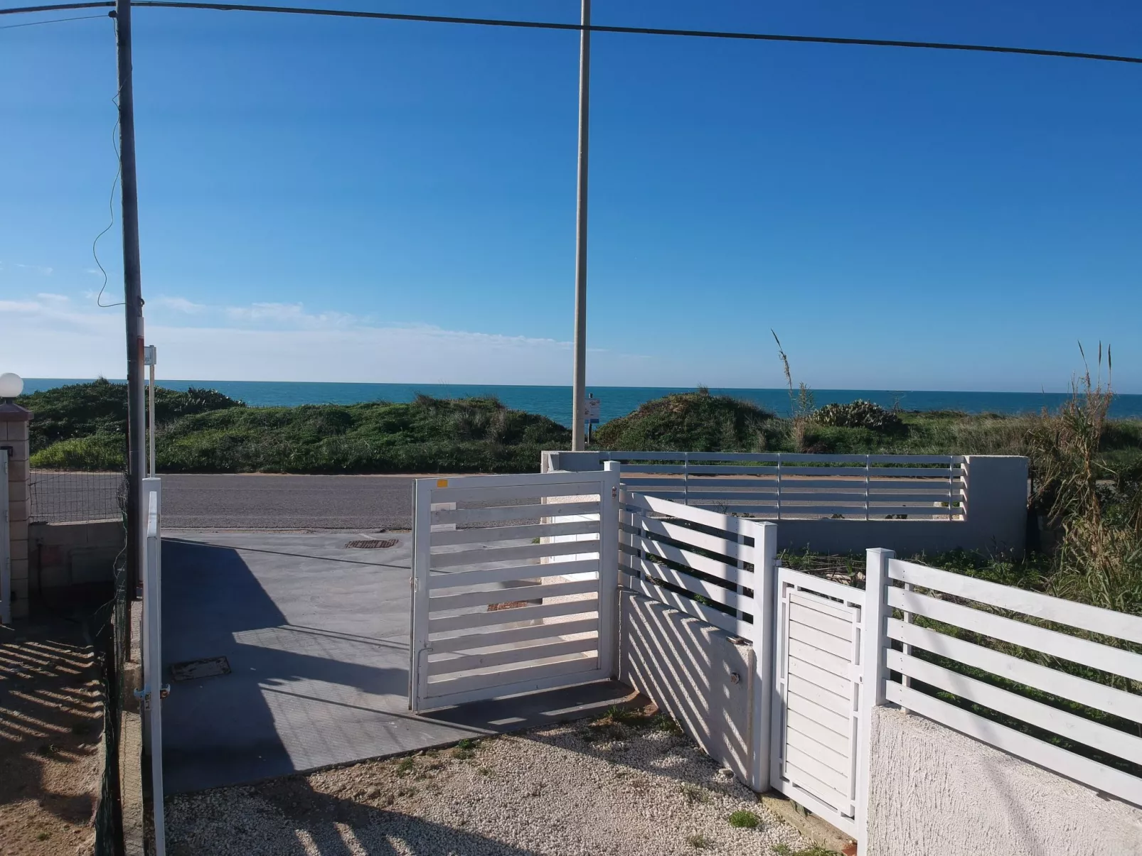 Edoné, Wohnung mit Blick auf einen Sandstrand-Dehors