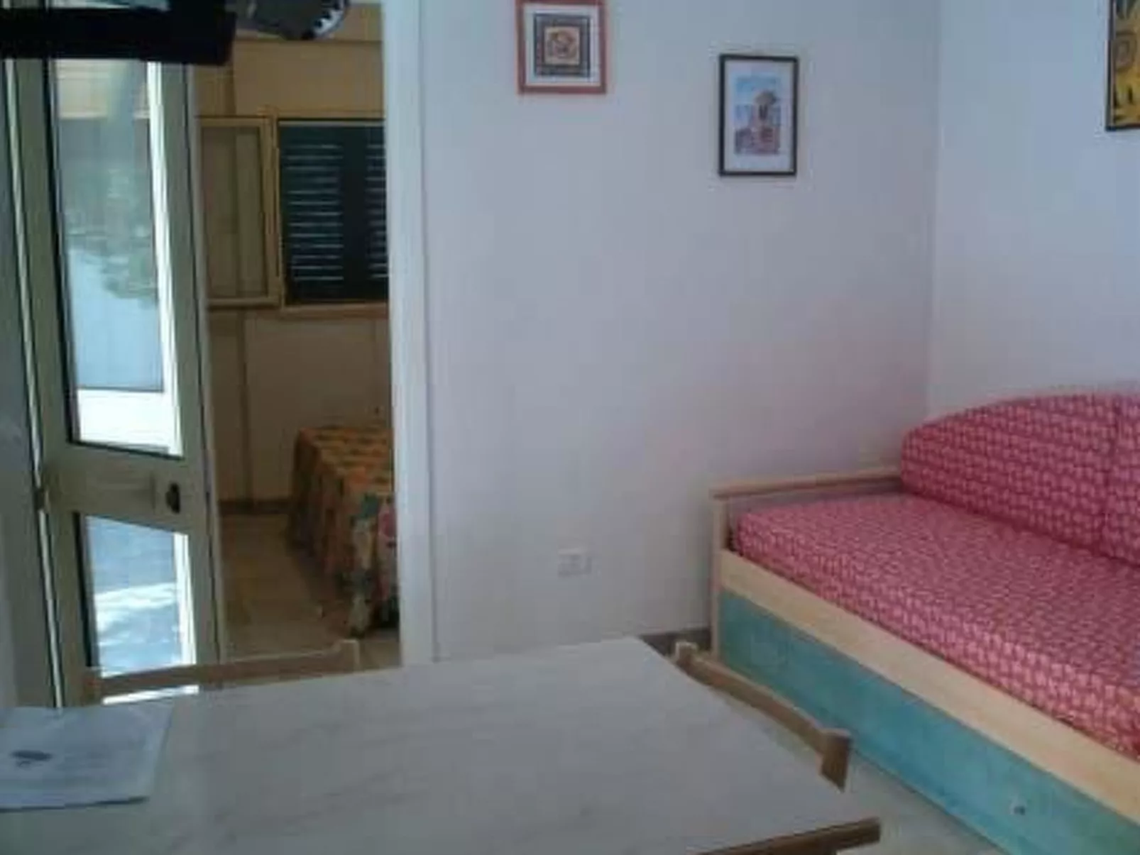 Orchideen-Ferienwohnung mit überdachter Veranda-Drinnen