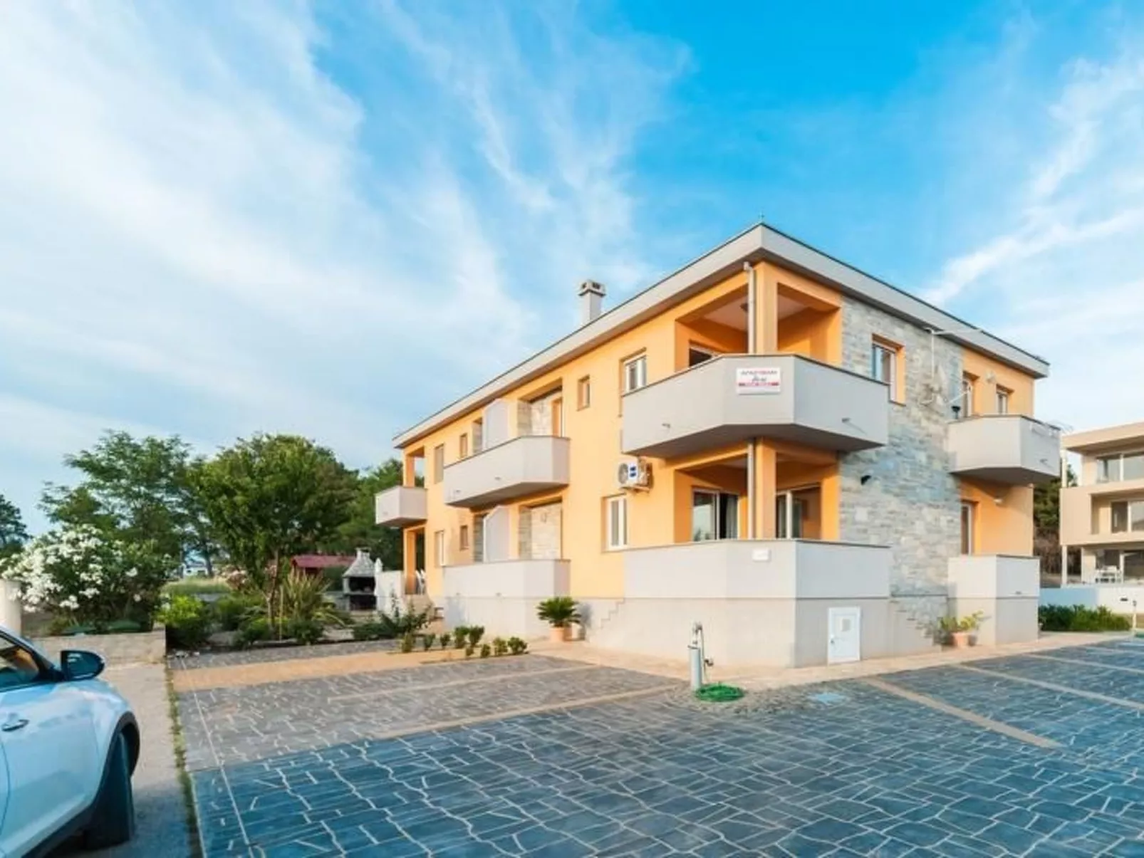 Wohnung "Maestral 03" direkt am Strand-Draußen