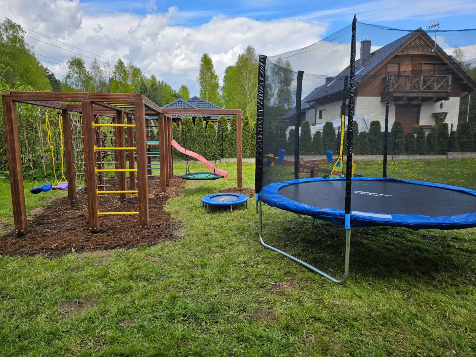 Ganzjährig bewohnbares Ferienhaus - grün-Draußen