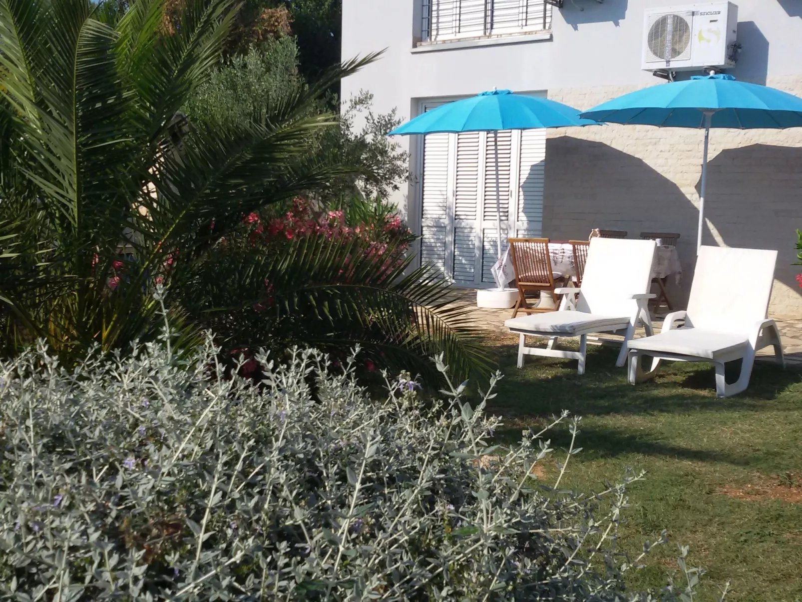 Direkt am Meer liegendes Apartment mit Garten-Dehors