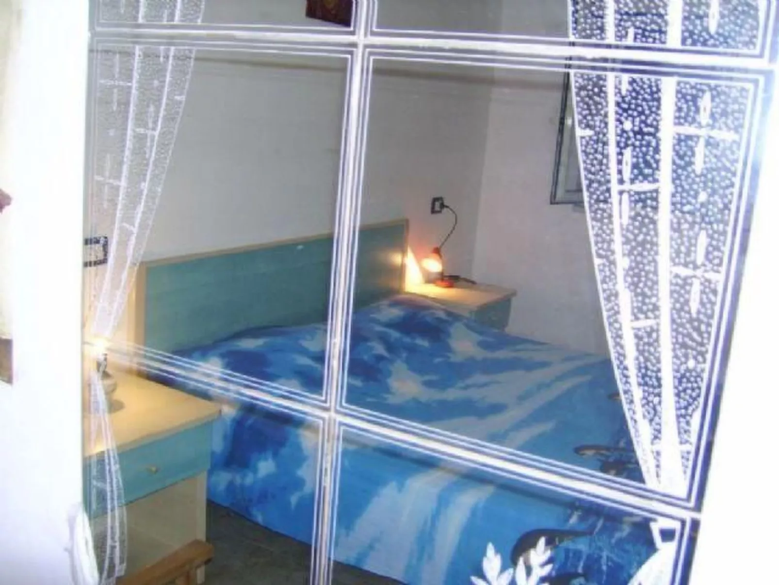 Orchideen-Ferienwohnung mit überdachter Veranda-Drinnen