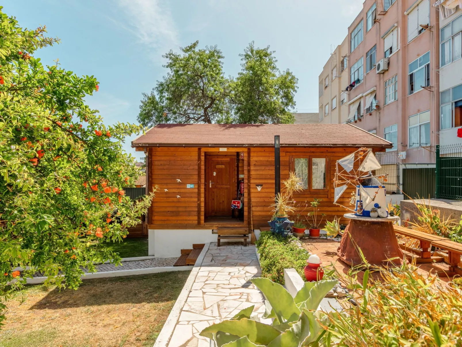 Nette Wohnung mit Kleinem gemeinsamem Pool - Outside