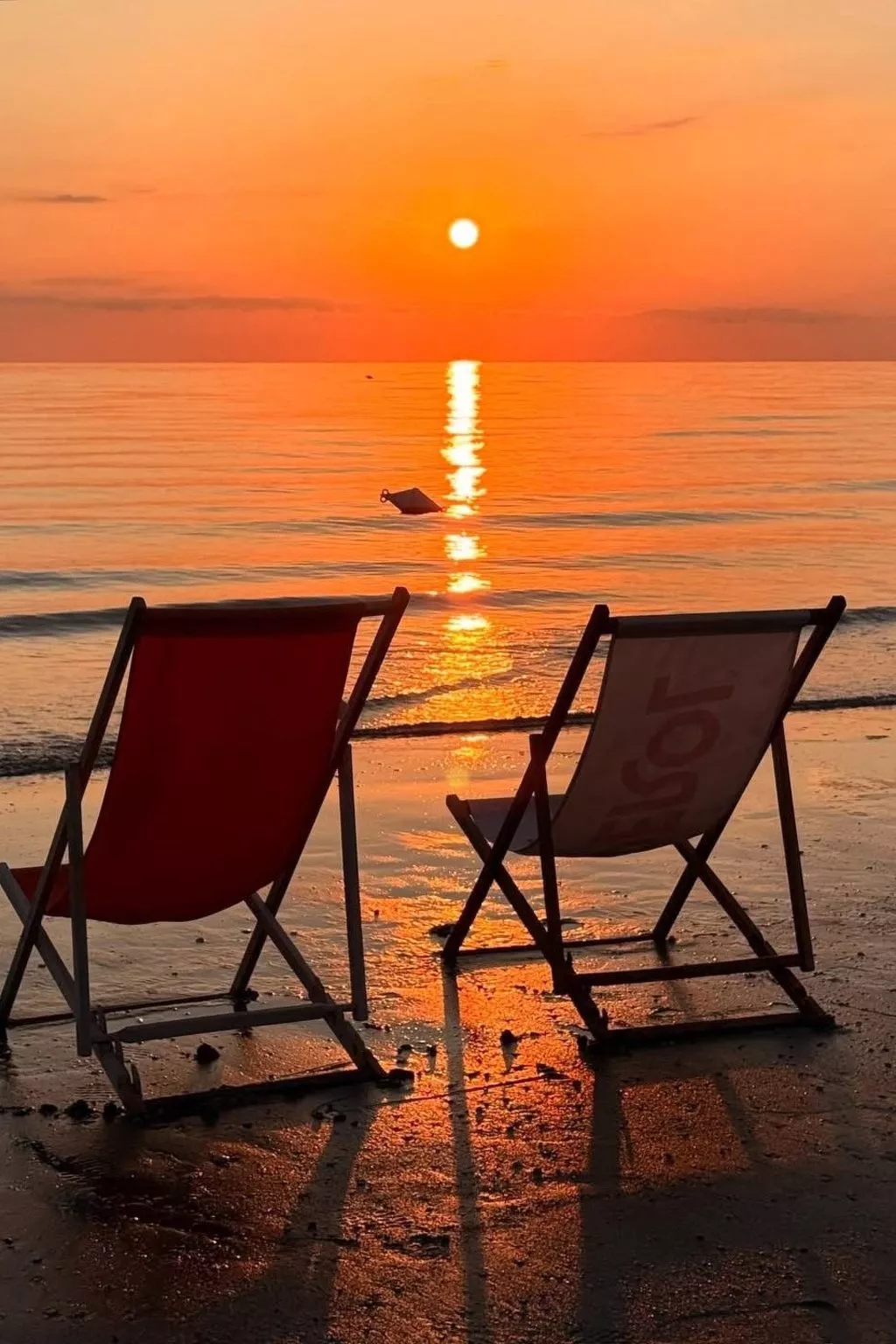 Flacher Strand und Zentrum, Privatparkplatz-Dehors