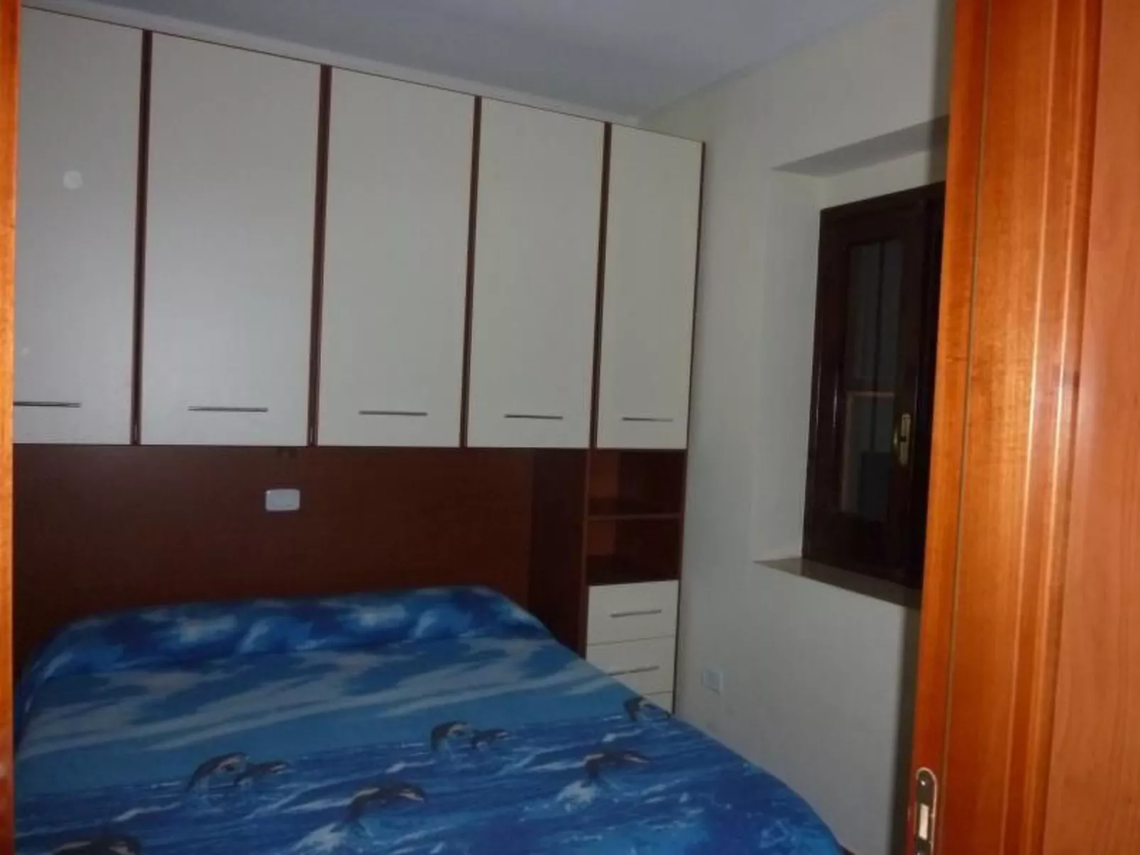 Orchideen-Ferienwohnung mit überdachter Veranda-Drinnen