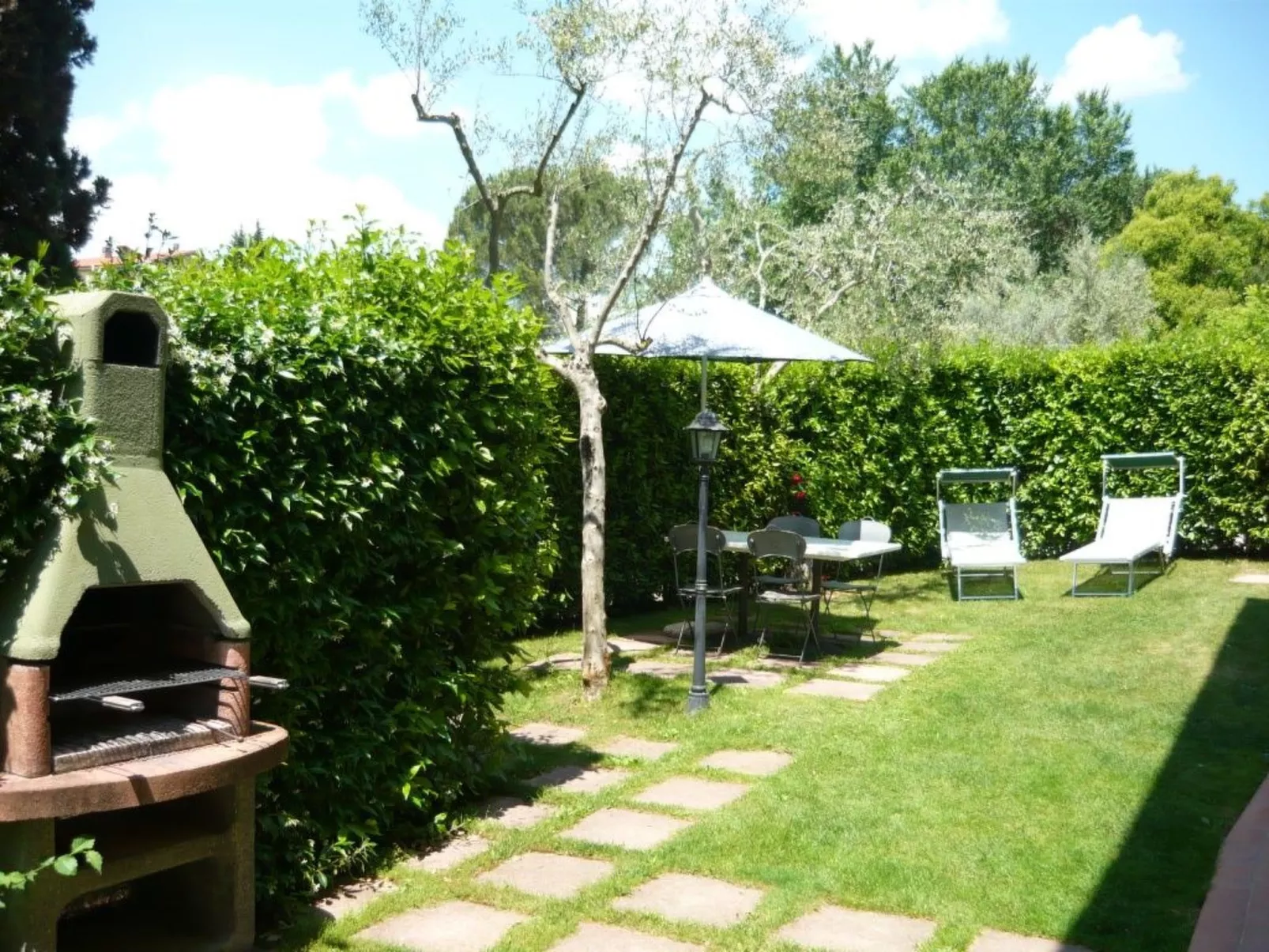 Wohnung in einem Ferienhaus mit Schwimmbad im Herzen der Toskana.-Dehors