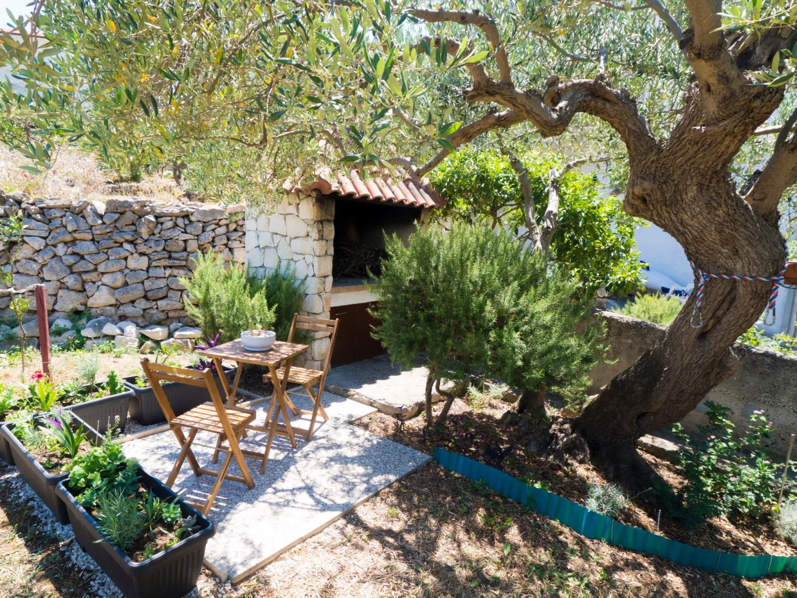 Strandnahe Ferienwohnung mit großer Terrasse-Draußen