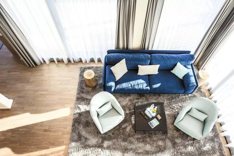 Apartments im MAREMÜRITZ Yachthafen Resort & Spa / Mare Grand Maisonette Suite 3 Erwachsene und 1 Kind 3-15 Jahre-Living room