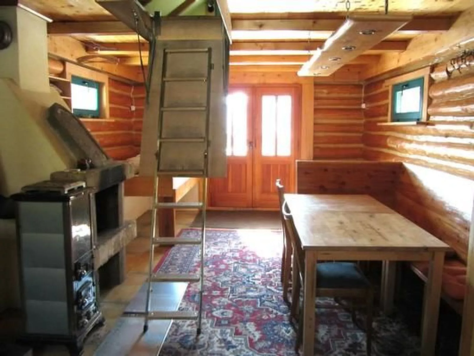 Blockhaus in Gajówka mit Kaminofen-Dedans