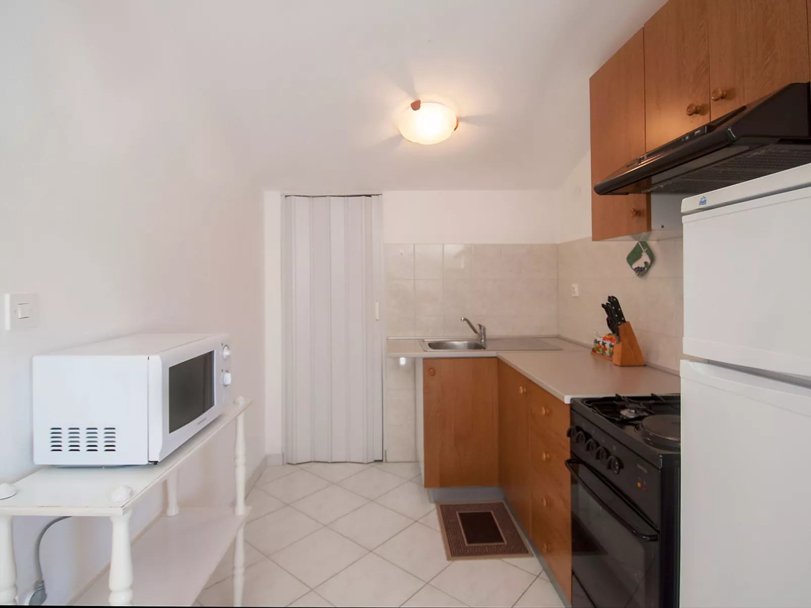 Appartement mit drei Schlafzimmern für 5 Personen in Meeresnähe-Dedans