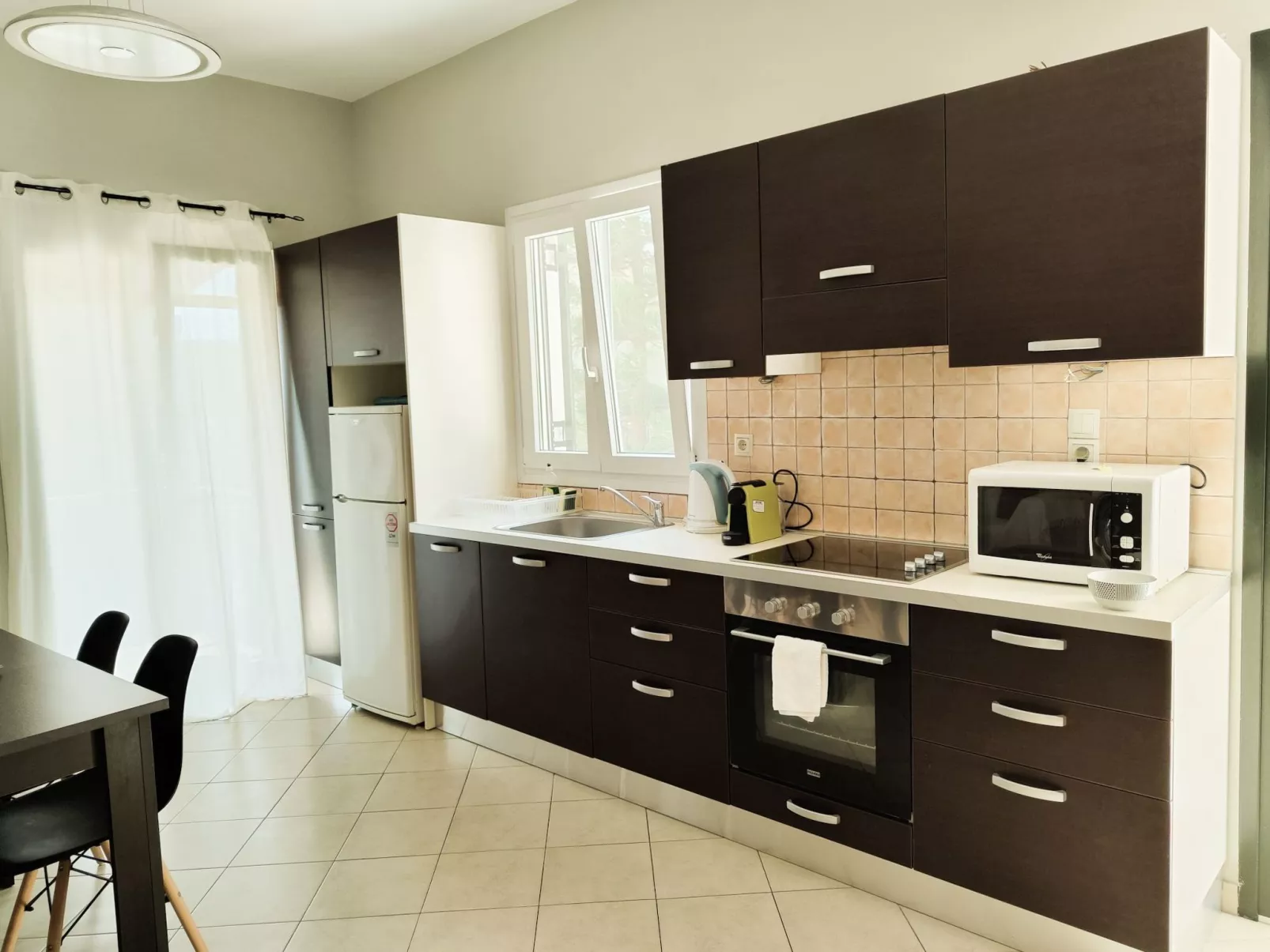 Gemütliches Olympia Apartment mit Pool-Drinnen