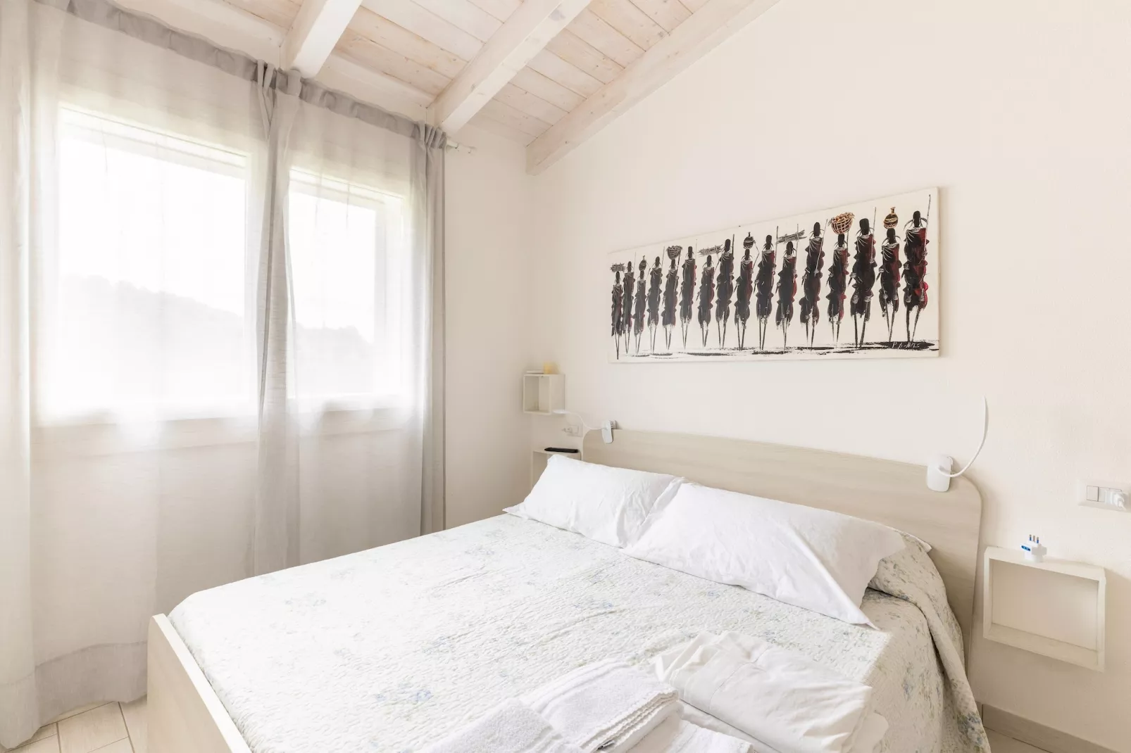 ATTICO BADESI CON PISCINA