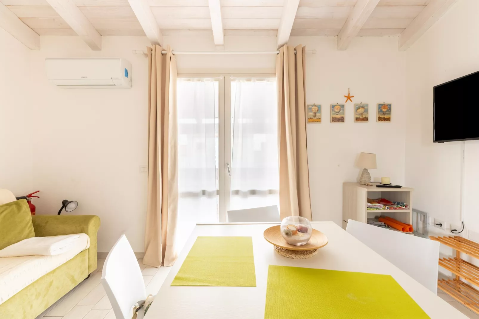 ATTICO BADESI CON PISCINA - Wohnzimmer