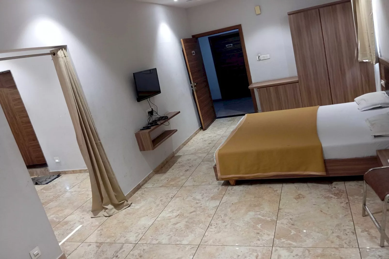 Collection O Kalol Junction Formerly Hotel Prime Land - Schlafzimmer