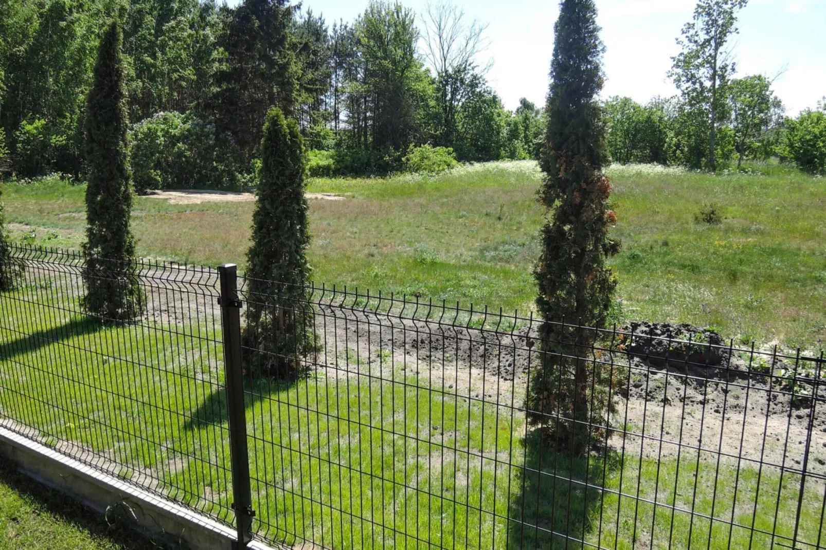 HolidayHouse with the big tarasse&garden in Kolczewo LIT-Gardens in summer