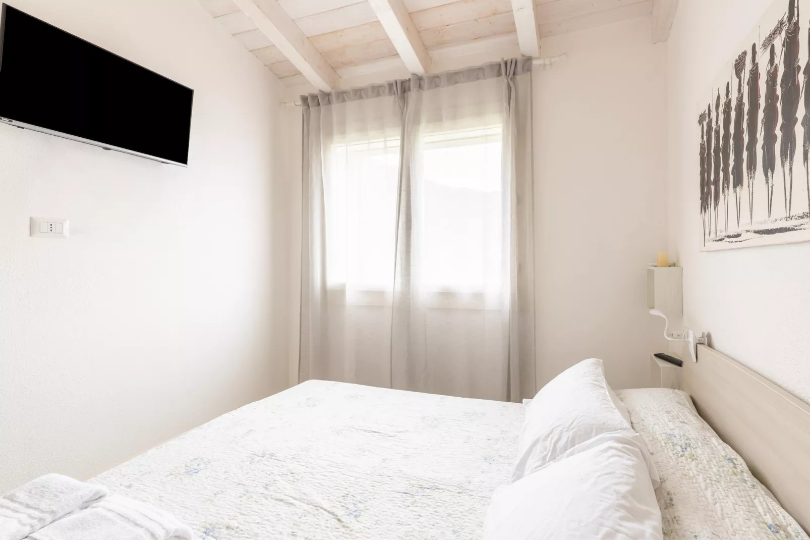 ATTICO BADESI CON PISCINA - Schlafzimmer