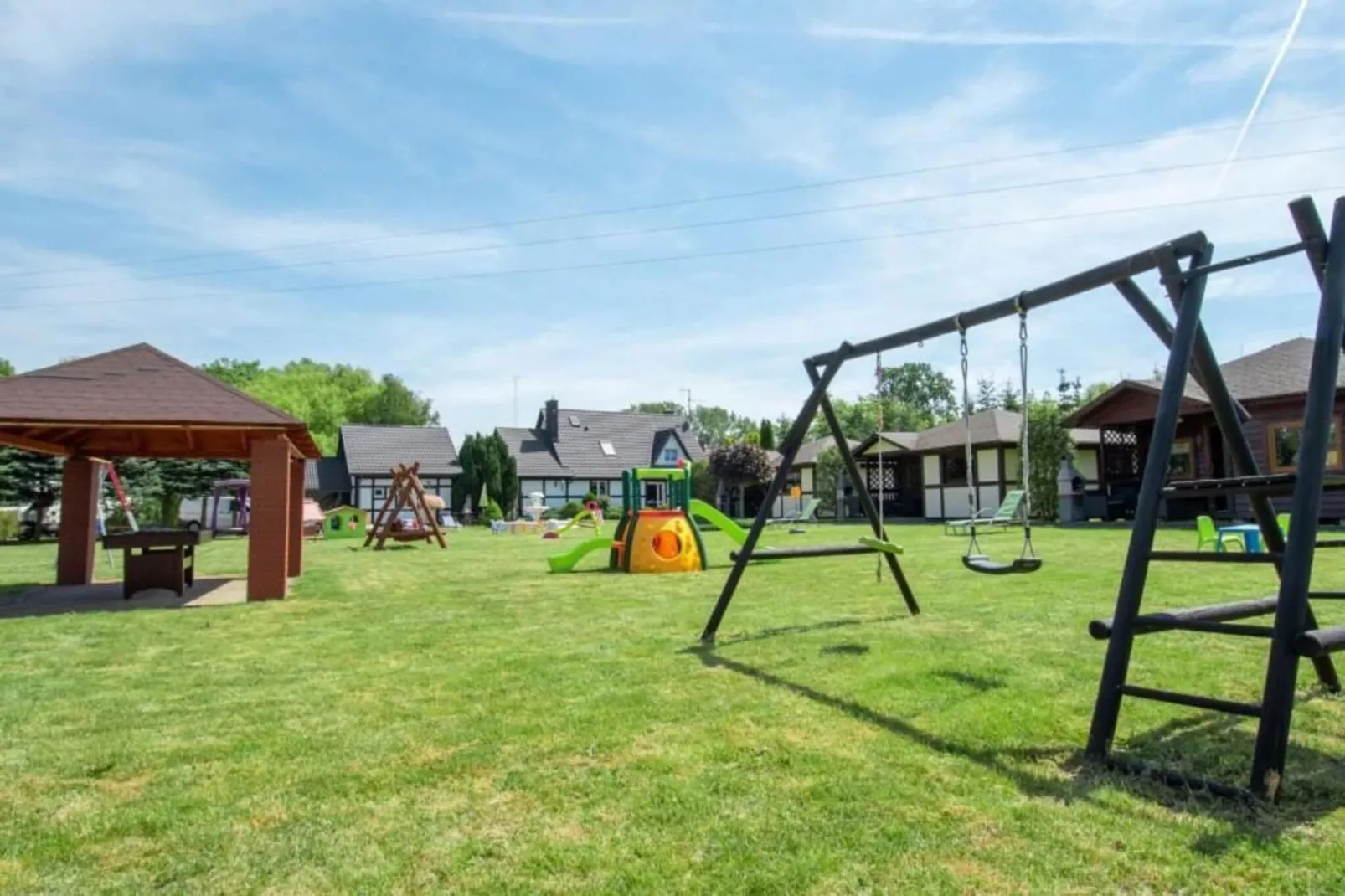 	Domki parterowe TYP A Łącko - Gardens in summer