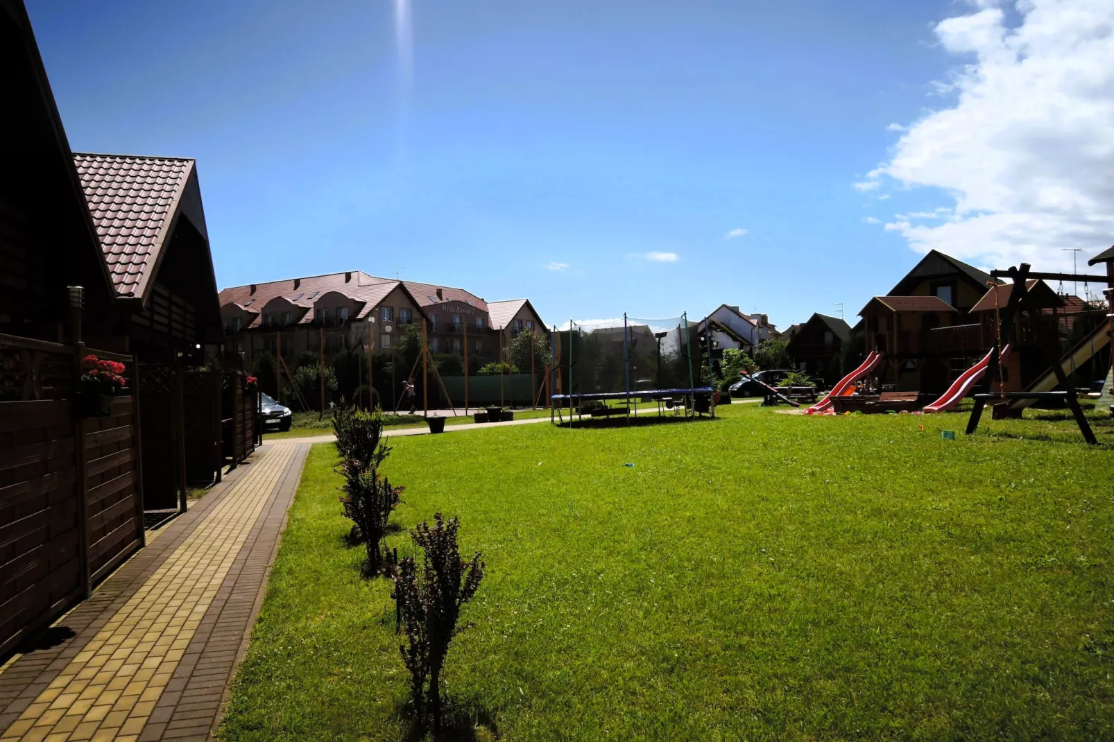 Domki wypoczynkowe - Promyczek - Jardins en été