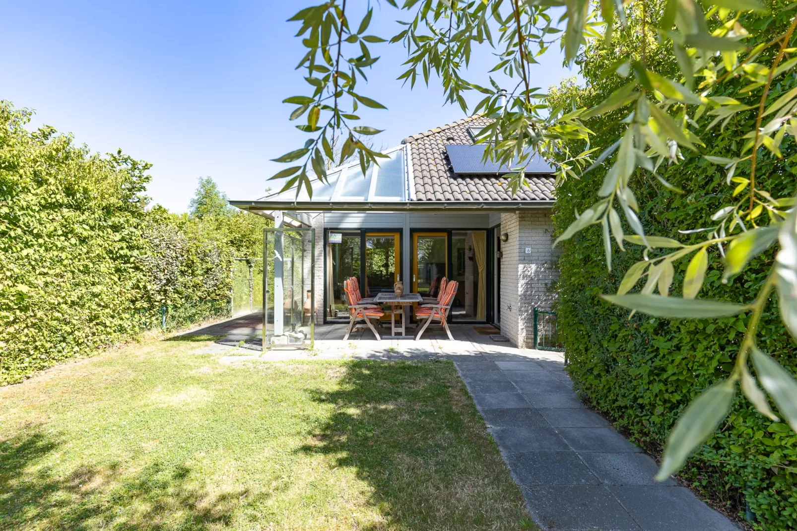 Vakantiewoning - Westduin 6 I Vlissingen 'Zilt en zand' - Jardins en été