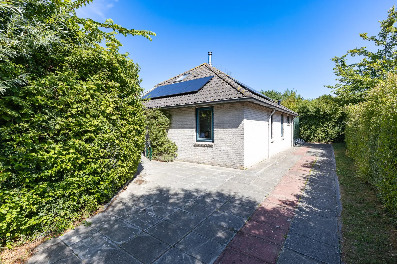 Vakantiewoning - Westduin 6 I Vlissingen 'Zilt en zand' - Jardins en été