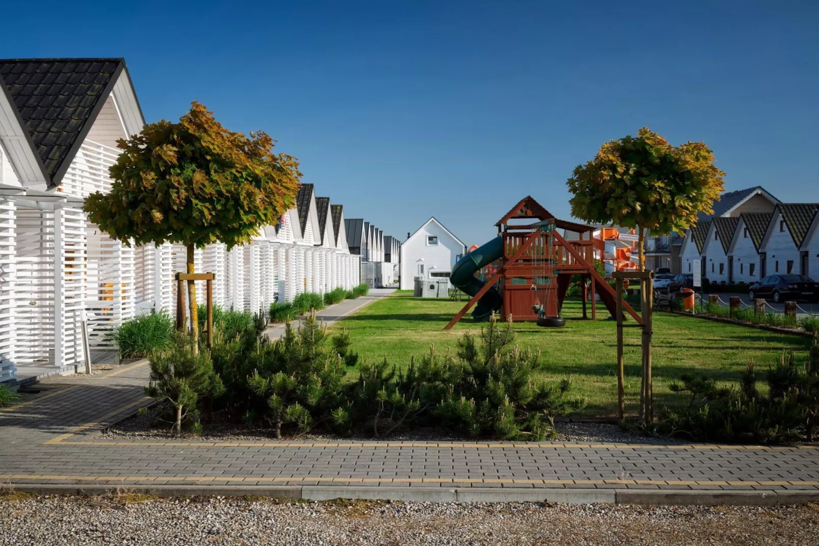 Domki PREMIUM Sarbinowo-Gardens in summer