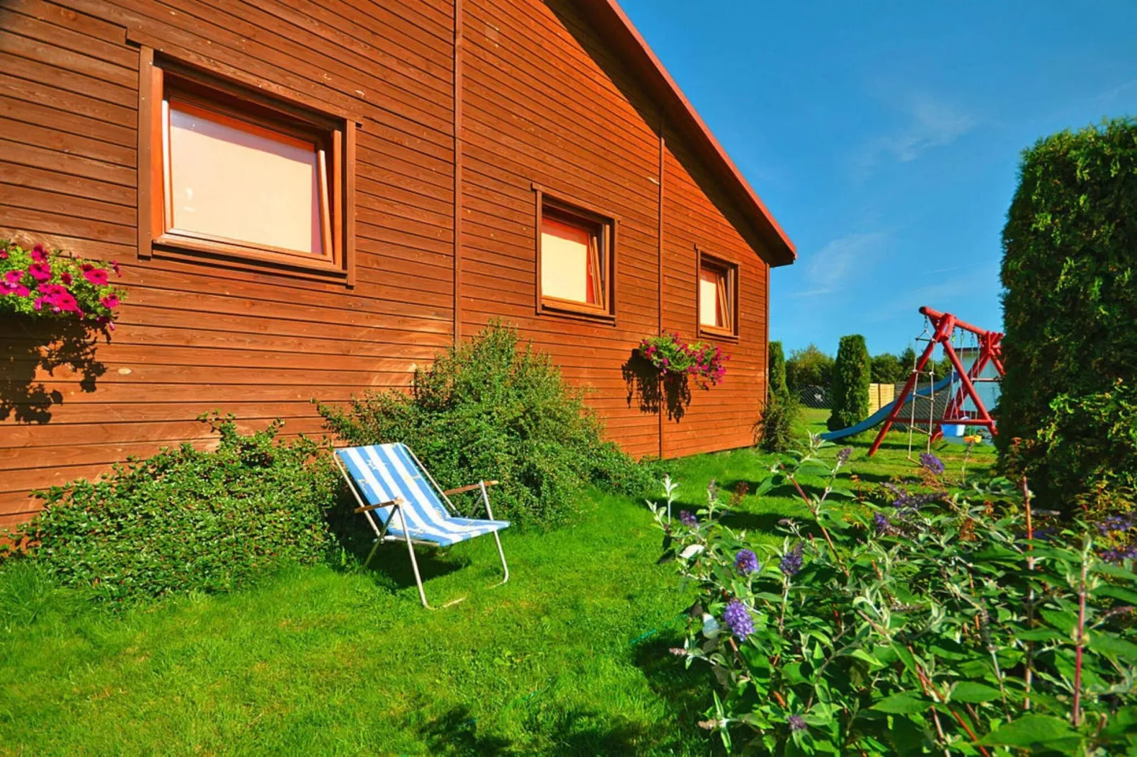 Domki wakacyjne Wicie-Gardens in summer