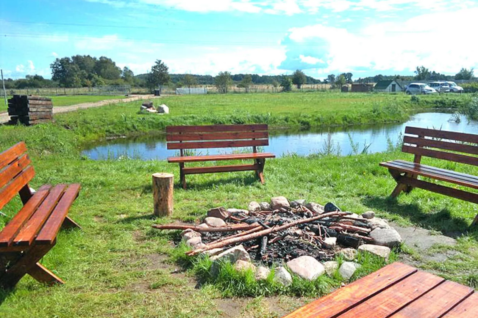 Domki wakacyjne przy basenie Jarosławiec-Gardens in summer