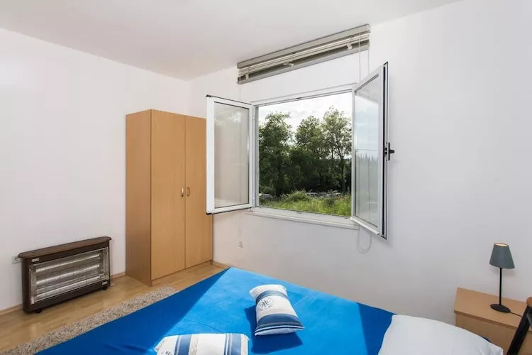 Apartments Villa Maslina - One-Bedroom Apartment with Terrace and Garden View-Bedroom