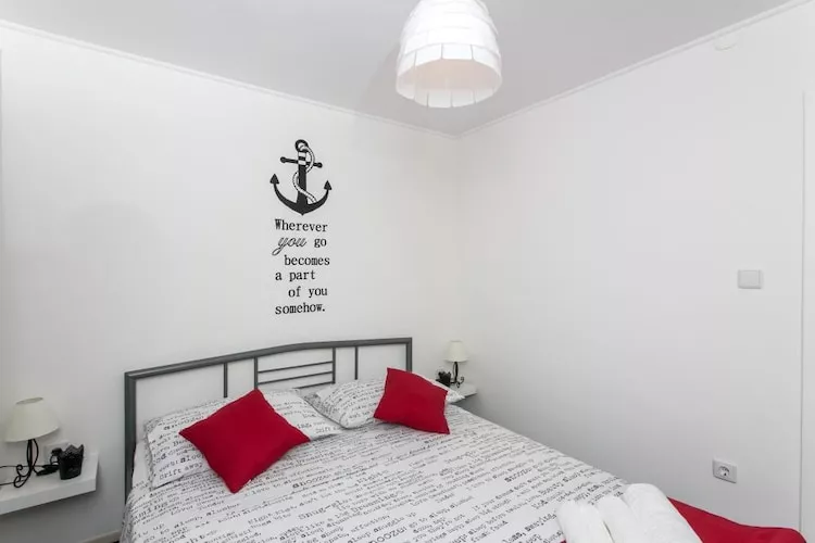 Holiday Home Magazin- One Bedroom Apartment with Terrace and Sea View-Bedroom