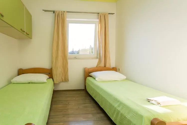 Guest House Fontana - Two Bedroom Apartment with Balcony and Sea View - Schlafzimmer
