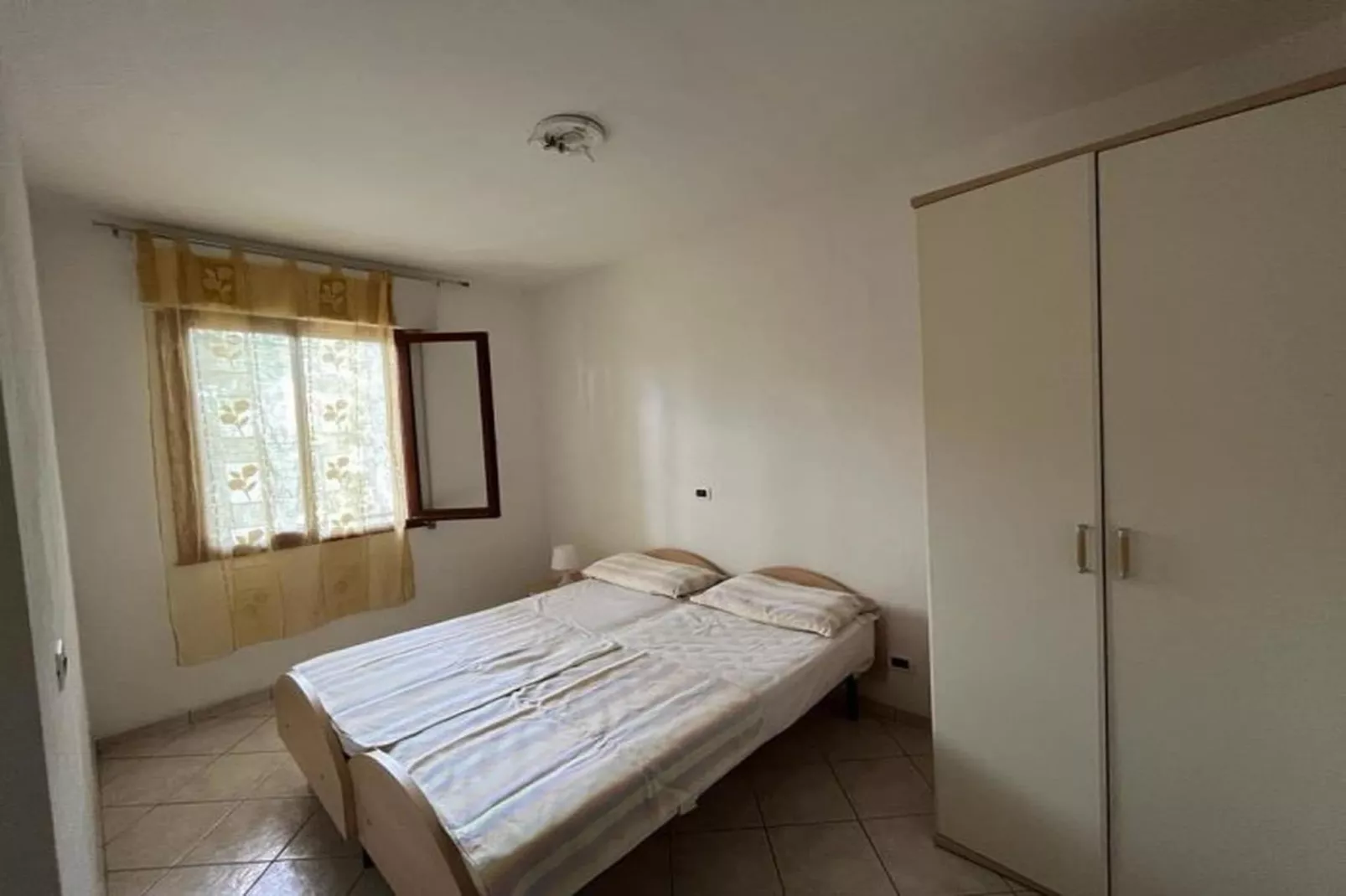 Solaris trilocale 72 -Chambre