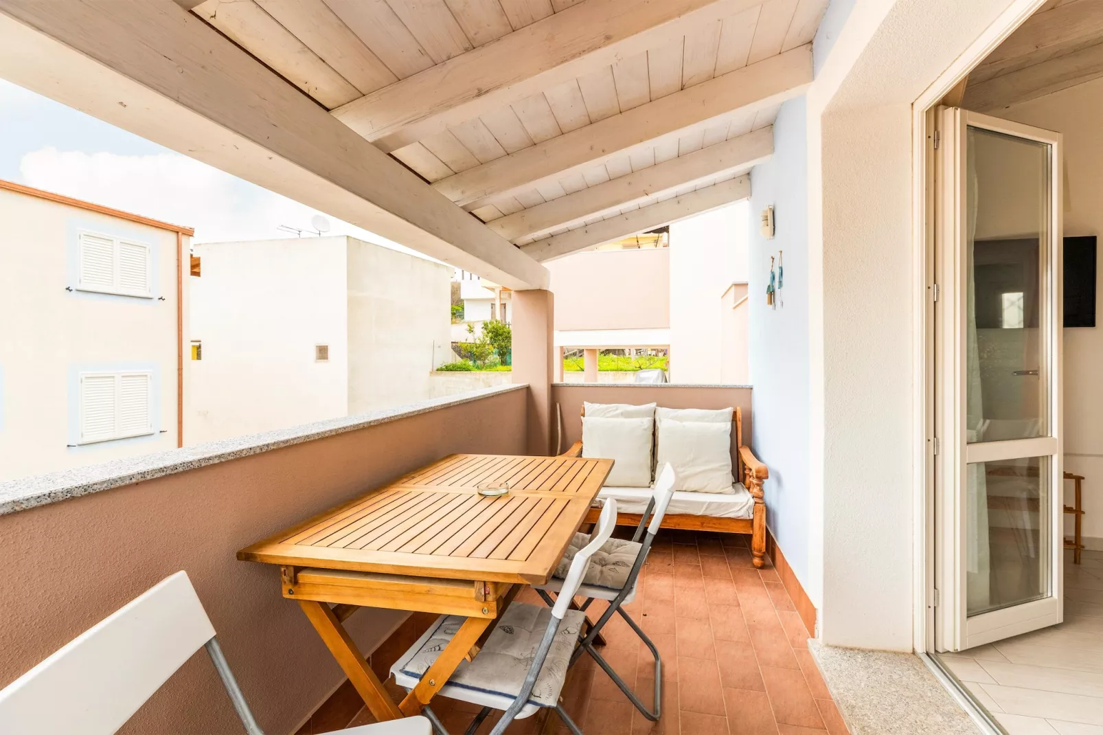 ATTICO BADESI CON PISCINA - Terrasse/Balkon