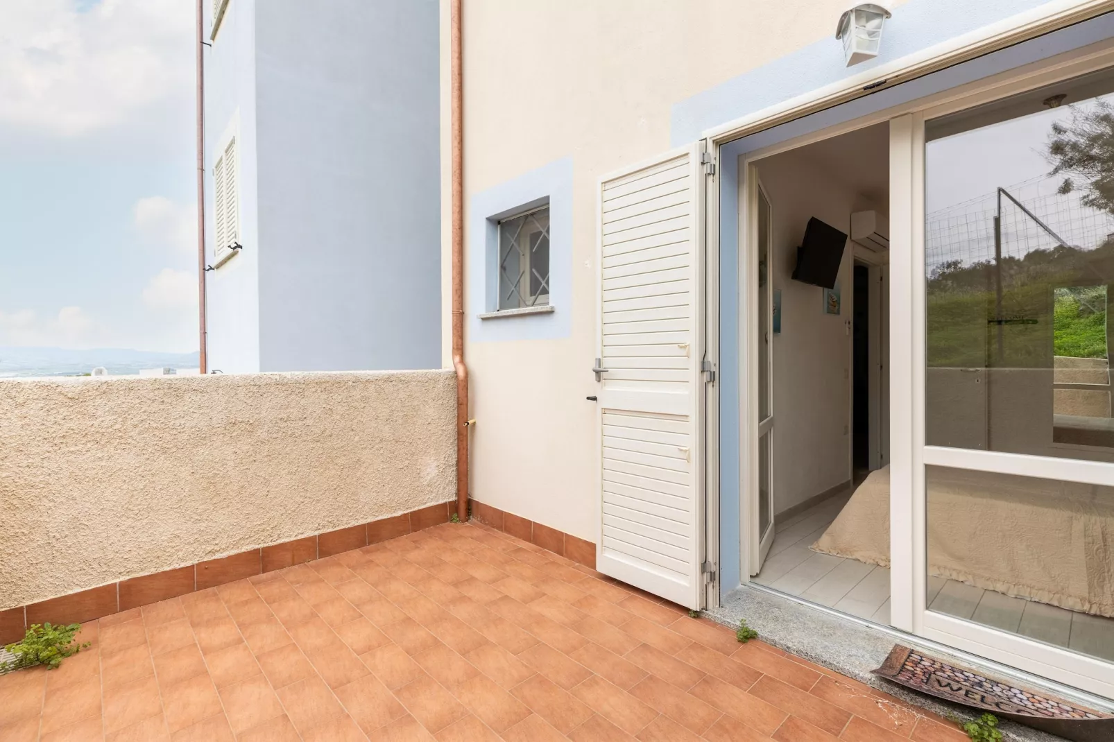 BILO BADESI CON PISCINA - Terrasse/Balkon